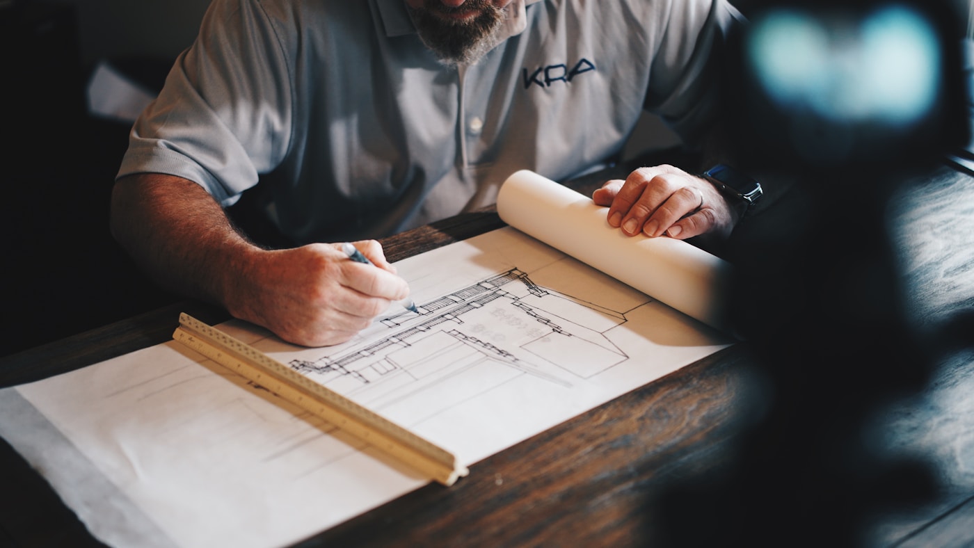 Architectural drawings and material samples for a residential project